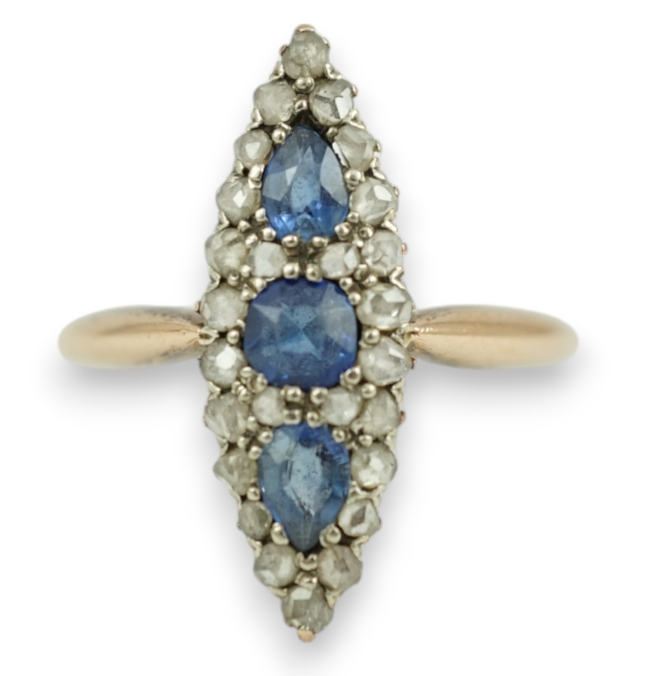 An early 20th century yellow metal, sapphire and rose cut diamond set marquise cluster ring, size Q, gross weight 2.8 grams.